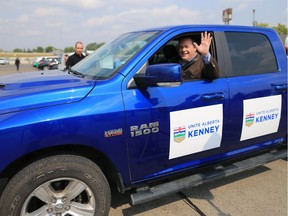 UCP leadership candidate Jason Kenny waves from his truck after speaking at a media event at the Blackfoot Diner in Calgary on Tuesday, Aug 1, 2017.