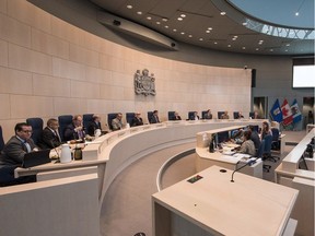 Edmonton's council, in a file photo, accepted an independent committee's advice that the next group of locally elected officials should take a pay cut.