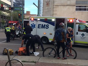 The scene at Jasper Avenue and 103 Street where a man running collapsed and was taken to hospital.