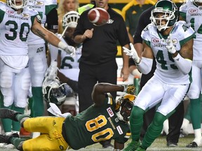 Saskatchewan Roughriders Kacy Rodgers II (45) intercepts the ball on Edmonton Eskimos Bryant Mitchell (80) and runs it in for a touchdown during CFL action at Commonwealth Stadium in Edmonton, August 25, 2017. Ed Kaiser/Postmedia (Edmonton Journal story by Terry Jones)
Ed Kaiser