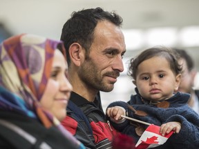 A Syrian refugee family  arrives in Edmonton on Dec. 19, 2015. The family was surviving in a camp in Lebanon before being sponsored by parishioners with St. Joseph's College at the University of Alberta.