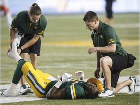 Edmonton Eskimos slotback D'haquille Williams (81) is injured against the B.C. Lions during second half CFL action in Edmonton, Alta., on Friday July 28, 2017.