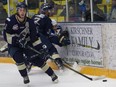 Spruce Grove Saints forward Josh Harris controls the puck behind his own net during AJHL action against the Fort McMurray Oil Barons at the Casman Centre in Fort McMurray Alta. on Friday December 2, 2016. The Saints beat the MOB 3-1. Robert Murray/Fort McMurray Today/Postmedia Network
Robert Murray, Robert Murray/Today Staff