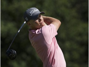 Max Rottluff watches his drive off the 17th hole during the Oil Country Golf Tournament at the Windermere Golf & Country Club on August 6, 2017.