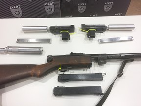 Seized submachine guns built in a machine shop west of Edmonton, say police.