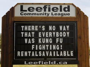 A humourous sign maintained by Leefield Community League president Wil Tonowski is seen along 34 Avenue near 91 Street in Edmonton on Thursday, August 3, 2017.