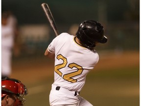 Edmonton Prospects' Jake Lanferman (22) hits a game winning ball during a Western Major Baseball League playoff game versus the Medicine Hat Mavericks at RE/MAX Field in Edmonton on Wednesday, August 9, 2017.
