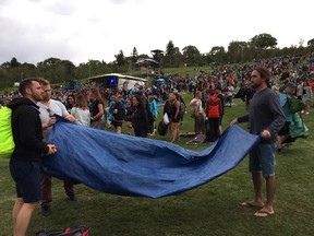 Folk Festival fans pack up early as stormy weather hit Edmonton on August, 10, 2017.