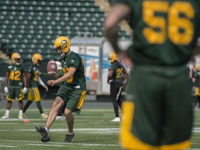 Kicker Hugh O'Neill practices his on-side kicks with long-snapper Levi Stenhauer (56) at practice on Aug. 23, 2017, at Commonwealth Stadium.