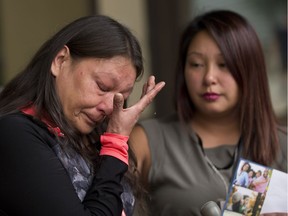 Lena Steinhauer's mother, Sheila Steinhauer is comforted by Lena's cousin Denise Steinhauer on Wednesday August 30, 2017, outside the Edmonton courthouse.  On February 9, 2015, police were called to a home at 112 Avenue and 95A Street after someone found Lena Steinhauer's body inside.