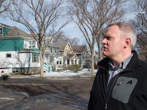 File: Edmonton Heritage Planner David Johnston in Westmount. When the Journal took a heritage tour with Johnston in 2015, the city had identified seven spots in mature neighbourhoods where the entire block face still reflected what the street looked like when it was originally constructed. These historic nods give a view through time, but the city wasn't sure how to protect them. Photo taken March 13, 2015.