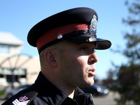Acting Staff Sgt. Jerrid Maze talks to reporters outside of the southeast division Edmonton police station on Friday, Aug. 25, 2017, after a four-year-old boy was found alone in a park. Charges are pending against two parents and five children from a home are now in the care of social services.