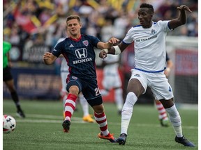 FC Edmonton defender Abdoulaye Diakité, right, knocks the ball away from Indy Eleven striker David Goldsmith in North American Soccer League play at Michael A. Carroll Stadium in Indianapolis, Indiana on Saturday Aug. 5, 2017. Diakité was named NASL Player of the Week on Monday.