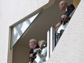 Visitors to Edmonton City Hall look at the building's architecture. The building was designed by Gene Dub and it opened in 1992.