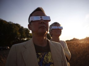 Clayton Uyeda and his wife Jo will be enjoying the partial eclipse while traveling from Swartz Bay to Tsawwassen ferry terminal on the mainland. The couple are photographed along Dallas Rd. in Victoria, B.C., on Friday, August 18, 2017.