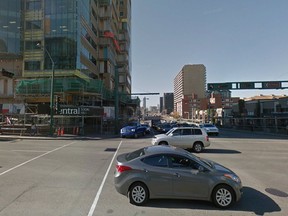 An image from Google Street view of the right turn lane on Jasper Avenue. This dedicated right turn lane was taken away in the Experience Jasper Avenue project but reinstated after wait times for vehicles tripled.