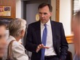 Minister of Finance Bill Morneau speaks with small business owners at a coffee shop in Vancouver, B.C., on Tuesday September 5, 2017.
