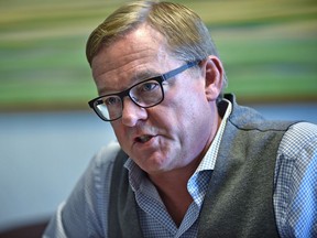 Education Minister David Eggen speaks from his legislature office Wednesday about a bill  he plans to introduce in the fall sitting.