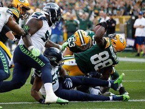 Green Bay Packers&#039; Ty Montgomery runs for a touchdown during the second half of an NFL football game against the Seattle Seahawks Sunday, Sept. 10, 2017, in Green Bay, Wis. (AP Photo/Mike Roemer)