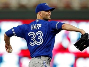 Toronto Blue Jays starting pitcher J.A. Happ throws to a Minnesota Twins batter during the first inning of a baseball game Friday, Sept. 15, 2017, in Minneapolis. (AP Photo/Jim Mone)