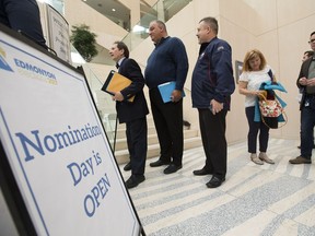 Candidates wait to file their nomination papers for Edmonton's upcoming municipal election, at City Hall on Monday Sept. 18, 2017.