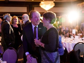 Stanley Milner, left, chats with daughter-in-law Lesley Milner during the EPL Gala in Edmonton on Thursday, Sept. 14, 2017.