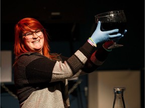 Shannon Gosling turns water into wine with a science demonstration during Lumen at the Telus World of Science in Edmonton on Thursday, Sept. 21, 2017.