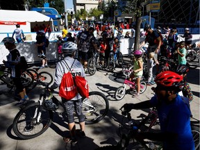 Parents and children complete the Velothon portion of Stage 4 of the Tour of Alberta in Edmonton on Monday, Sept. 4, 2017.