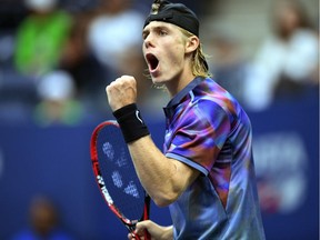 Canada's Denis Shapovalov celebrates a point against Spain's Pablo Carreno Busta in their qualifying men's singles match at the 2017 U.S. Open tennis tournament on Sept. 3, 2017 in New York.