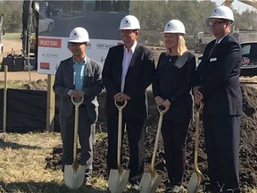 From left: NDP MLA Thomas Dang; Tom Ruth, president and CEO of Edmonton International Airport; Lorraine Card, Alberta Motor Transport Association president; and Chris Nash, vice-chairman, AMTA board of directors, at the groundbreaking ceremony for AMTA's new driver training facility on Wednesday, Sept. 6, 2017.