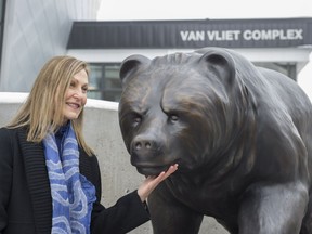 Cathryn Jenkins sculpted the Alberta Bear statue outside the PAW Centre on the University of Alberta campus. The life-sized Grizzly Bear statue weighs 500 kilograms and was commissioned to celebrate the 50th anniversary of the Faculty of Physical Education and Recreation.