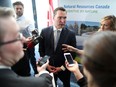 Deron Bilous, Alberta's minister of economic development and trade, speaks with media in Calgary  following the announcement of $26 million in federal and provincial funding for oil and gas clean tech projects on Thursday, May 11, 2017.