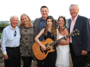 Helping make the 18th annual Zin on the River at the Fairmont Hotel Macdonald a success last week were (from left) Fringe champion Bob Westbury of Telus, CASA Foundation executive director Nadine Samycia, singer-songwriter Hailey Benedict, wine agent Winter Dzaman and Dave Majeski of Lexus.