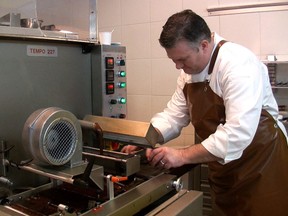 Brett Roy (owner and chocolatier) making his chocolates and other confection. FILE PHOTO