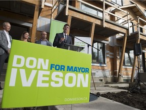 Don Iveson picked this stacked rowhouse development as a background for his policy announcement Monday.