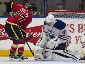 Edmonton Oilers goalie Dylan Wells stops Calgary Flames' Matthew Phillips in close during the NHL Young Stars Classic hockey action at the South Okanagan Events Centre in Penticton, B.C., on Sept. 8, 2017. Richard Lam/Postmedia

Full Full contract in place
RICHARD LAM Stuart Gradon, PNG