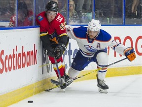 Calgary Zoo

Calgary Flames forward Dillion Dube, left, gets hit by Edmonton Oilers defenceman Ethan Bear along the end boards during the Young Stars Classic hockey action at the South Okanagan Events Centre in Penticton, B.C., on Sept. 8, 2017. Richard Lam/Postmedia

Full Full contract in place
RICHARD LAM Stuart Gradon, PNG