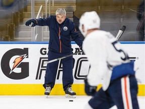 Todd McLellan, Mark Letestu Head coach Todd McLellan shouts instructions to Mark Letestu during the Edmonton Oilers training camp at Rogers Place in Edmonton on Friday, Sept. 15, 2017.
