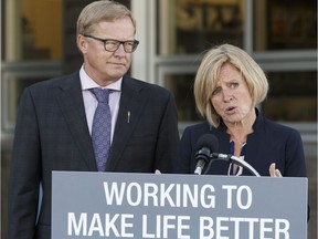 Education minister David Eggen (left) and Premier Rachel Notley answer questions at the opening of École Lois E. Hole Elementary School in St. Albert on September 5, 2017.