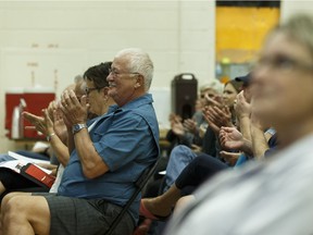 Audience members applaud during the Ward 3 candidate forum organized by Edmonton Elections at Londonderry Junior High School in Edmonton, Alberta on Wednesday, September 27, 2017.