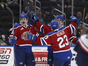 Edmonton's Colton Kehler (23) celebrates a goal with teammates during a Western Hockey League game between the Edmonton Oil Kings and the Lethbridge Hurricanes at Rogers Place in Edmonton, on Friday, September 29, 2017.