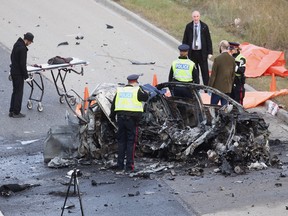 Police investigate a fatal collision on Whitemud Drive, north of Quesnell Bridge, on Monday September 25, 2017. Photo by David Bloom/Postmedia