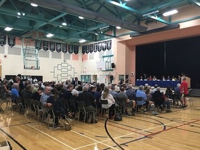 Residents wait for the debate to start at the Ward 5 candidate forum in Edmonton on Sept. 28, 2017.