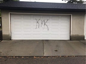The garage door of former Edmonton Eskimos player Craig Ellis was vandalized with a racist message Thursday.