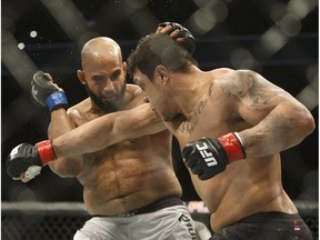 Luis Henrique of Brazil, right, misses a punch on Arjan Singh Bhullar of Canada during their mixed martial arts bout at UFC 215 in Edmonton, Alta., on Saturday September 9, 2017.
