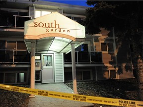 Police investigate the scene of a homicide at a condominium building at 9725 82 Ave. in Edmonton on Sept. 4, 2012.