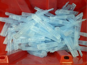 A bin of needles distributed by the Streetworks organization at Boyle Street Community Services in downtown Edmonton.