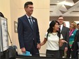 Incumbent Mayor Don Iveson with his wife, Sarah Chan, files his papers during nomination day for the civic election in Edmonton, Sept. 18, 2017.