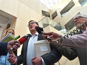 Candidate for mayor, Don Koziak speaks to the media after filing his papers during nomination day for the civic election in October