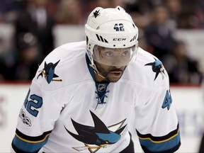 San Jose Sharks right wing Joel Ward lines up against the Arizona Coyotes during the third period of an NHL hockey game in Glendale, Ariz. Ward tells The Mercury News he might take a knee during the national anthem at an upcoming game, becoming the first NHL player to join the protests that started in the NFL and drew criticism from President Donald Trump.